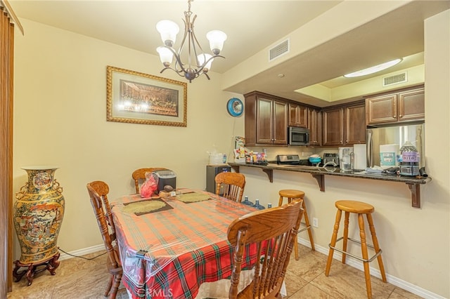 12229 Inspire Ln, Pacoima, CA 91331 - dining room with a chandelier and baseboards