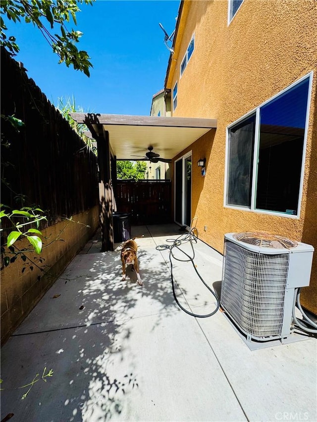 12229 Inspire Ln, Pacoima, CA 91331 - view of patio / terrace featuring cooling unit, a ceiling fan, and fence