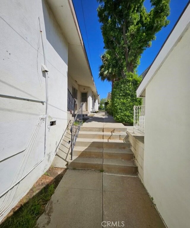 view of property exterior with stucco siding