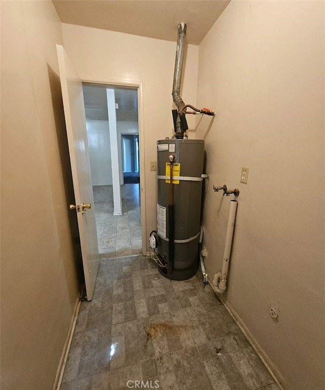 utility room with water heater