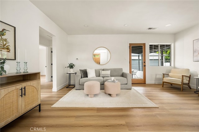 6655 Balcom Ave, Reseda, CA 91335 - living area featuring light wood-style floors, visible vents, baseboards, and recessed lighting