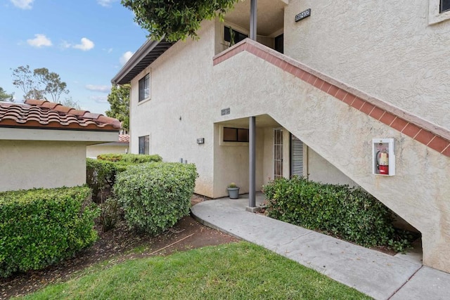 992 Lupine Hills Dr Unit 98, Vista, CA 92081 - view of exterior entry featuring stucco siding
