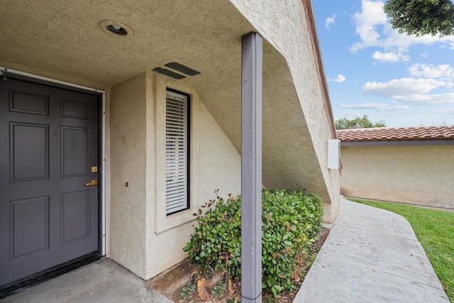 992 Lupine Hills Dr Unit 98, Vista, CA 92081 - doorway to property with stucco siding