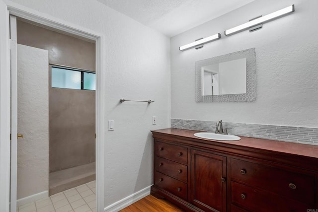 992 Lupine Hills Dr Unit 98, Vista, CA 92081 - full bath featuring vanity, a walk in shower, and baseboards