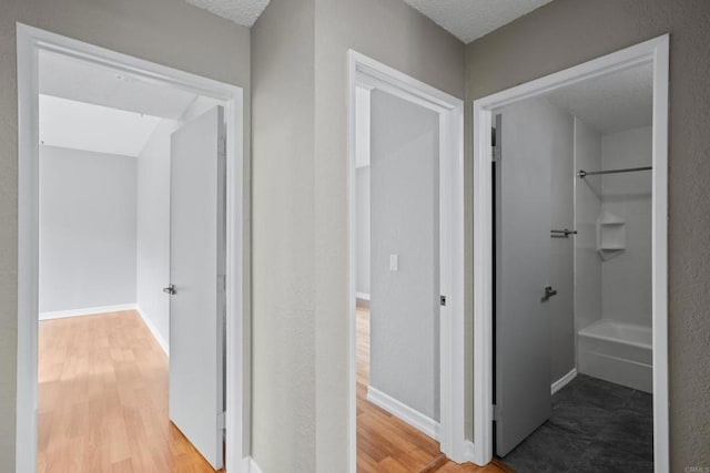 992 Lupine Hills Dr Unit 98, Vista, CA 92081 - hallway featuring baseboards and wood finished floors
