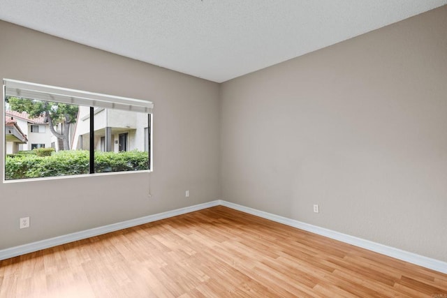 992 Lupine Hills Dr Unit 98, Vista, CA 92081 - empty room with light wood-style floors and baseboards