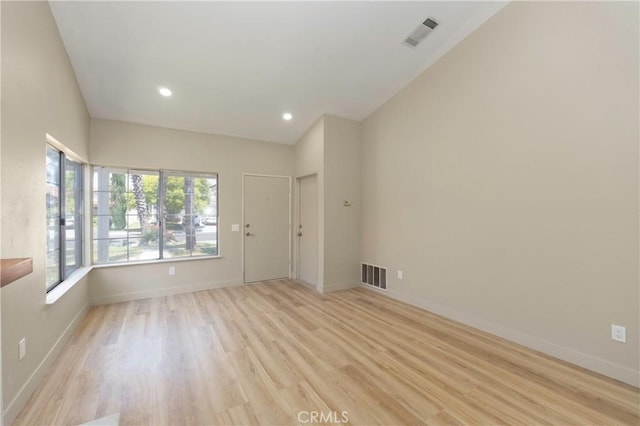 25815 Basil Ct, Moreno Valley, CA 92553 - spare room featuring light wood-style flooring, baseboards, and recessed lighting
