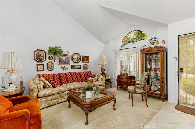 672 La Quinta Dr, Banning, CA 92220 - living room with vaulted ceiling and light tile patterned floors