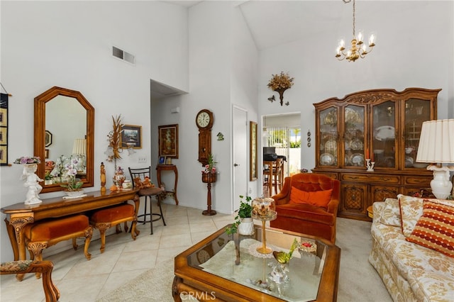 672 La Quinta Dr, Banning, CA 92220 - living room with a chandelier, light tile patterned flooring, high vaulted ceiling, and visible vents