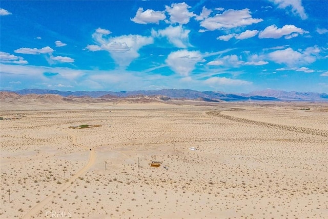 property view of mountains with a rural view and view of desert