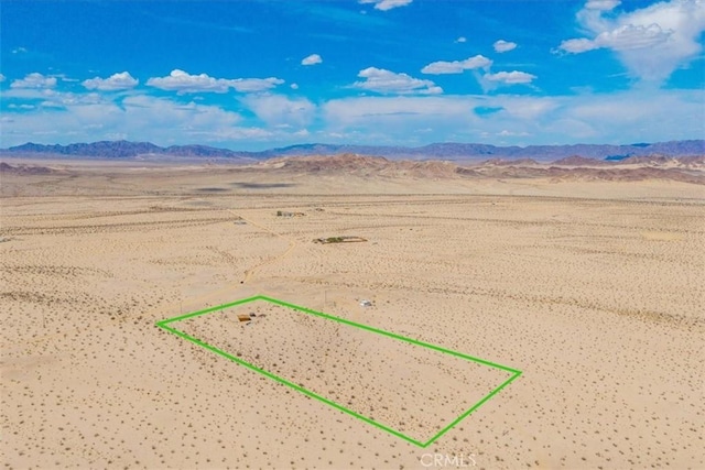 bird's eye view with a mountain view, a desert view, and a rural view