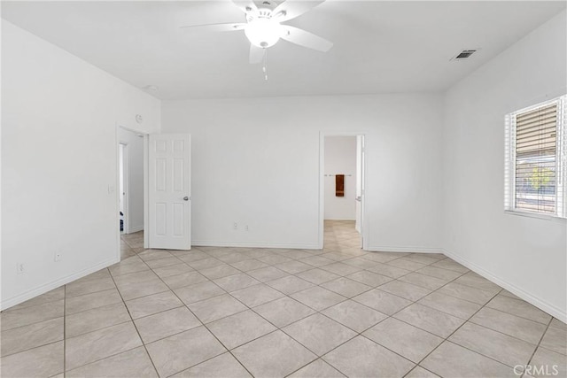 21683 Ramona Rd, Apple Valley, CA 92307 - spare room featuring ceiling fan, baseboards, light tile patterned floors, and visible vents