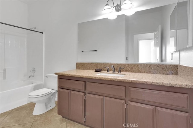 21683 Ramona Rd, Apple Valley, CA 92307 - full bathroom with toilet, tile patterned flooring, vanity, and shower / washtub combination