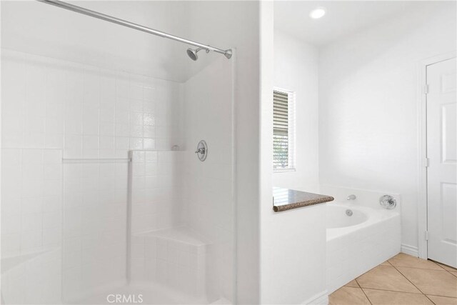 21683 Ramona Rd, Apple Valley, CA 92307 - bathroom with a tile shower, tile patterned flooring, and a garden tub