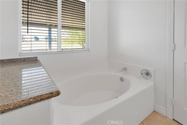 21683 Ramona Rd, Apple Valley, CA 92307 - full bath featuring tile patterned floors, a bath, and a healthy amount of sunlight