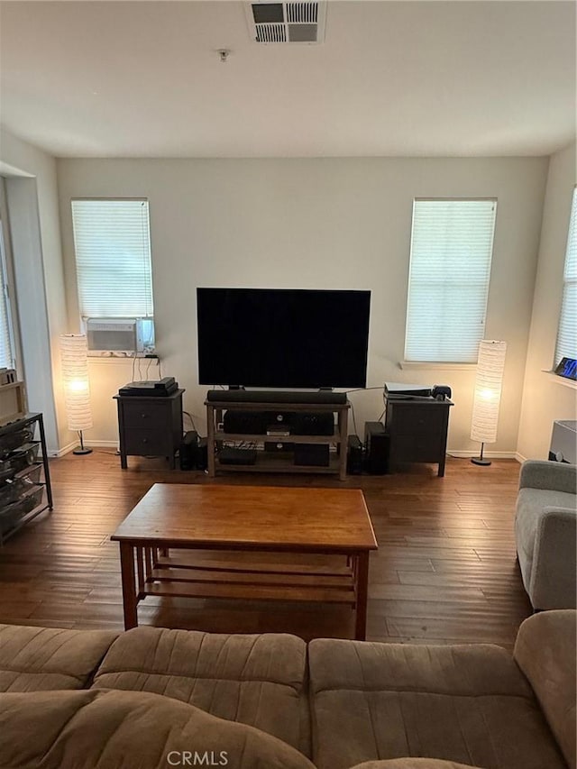 3591 Sacramento Dr Unit 86, San Luis Obispo, CA 93401 - living room with baseboards, cooling unit, visible vents, and hardwood / wood-style flooring