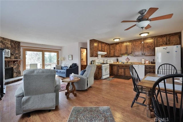 39177 Arapahoe Rd, Fawnskin, CA 92333 - living room featuring a ceiling fan and wood finished floors