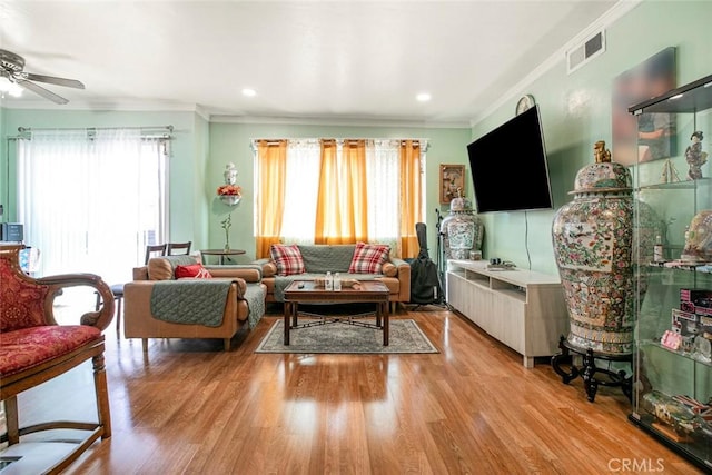 17151 Roscoe Blvd Unit 21, Northridge, CA 91325 - living area with crown molding, a ceiling fan, light wood-style flooring, and recessed lighting