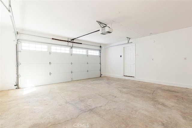 garage featuring a garage door opener
