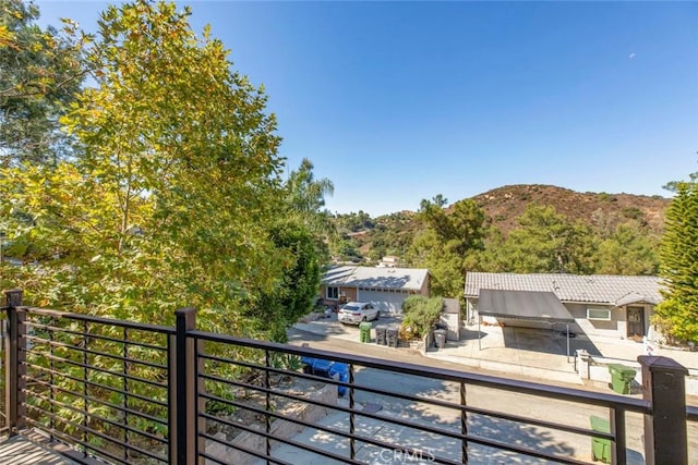 balcony featuring a mountain view