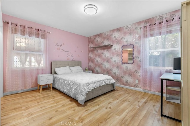 3348 Burritt Way, La Crescenta, CA 91214 - bedroom featuring wood finished floors, baseboards, wallpapered walls, and multiple windows