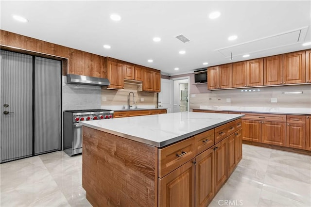 3348 Burritt Way, La Crescenta, CA 91214 - kitchen featuring a sink, extractor fan, visible vents, a center island, and high end range