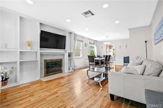 3348 Burritt Way, La Crescenta, CA 91214 - living room featuring a fireplace, wood finished floors, visible vents, and recessed lighting