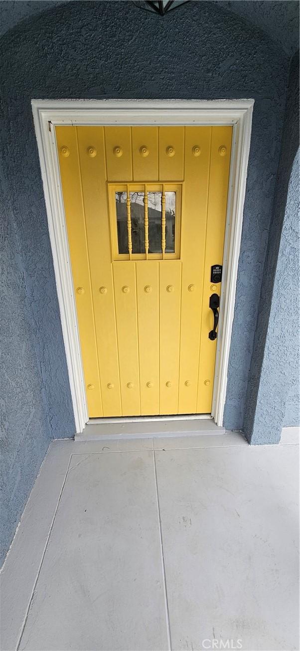 208 S Burris Ave, Compton, CA 90221 - view of exterior entry with stucco siding