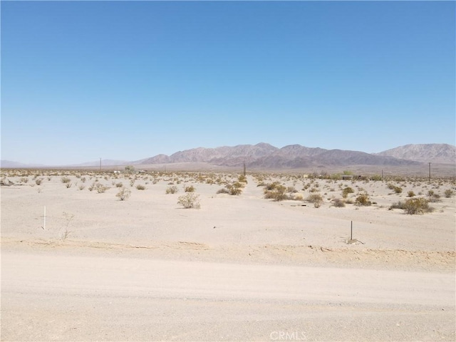 view of mountain feature featuring a rural view and a desert view