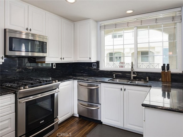 5447 Marine Ave Unit 7, Lawndale, CA 90260 - kitchen featuring a sink, white cabinets, and appliances with stainless steel finishes