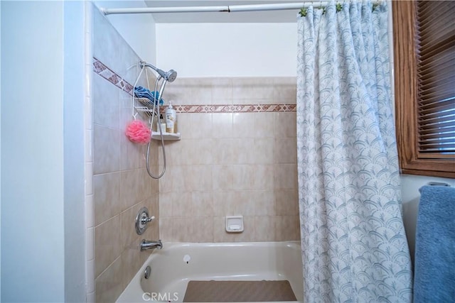 full bath featuring shower / bath combination with curtain