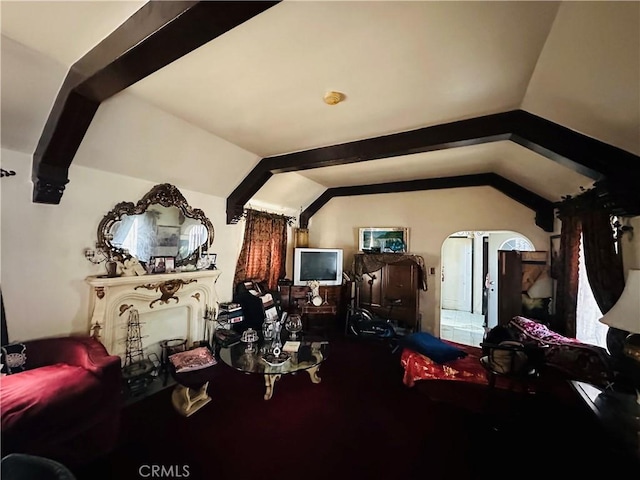 606 W 57th St, Los Angeles, CA 90037 - bedroom with arched walkways, lofted ceiling, and carpet flooring