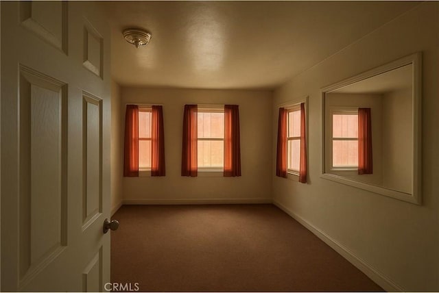606 W 57th St, Los Angeles, CA 90037 - unfurnished room with carpet and baseboards