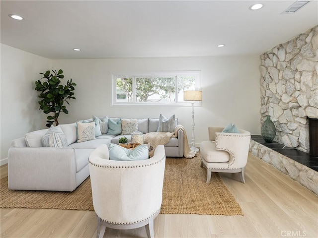 5244 W 137th Pl, Hawthorne, CA 90250 - living area featuring recessed lighting, a fireplace, visible vents, and wood finished floors