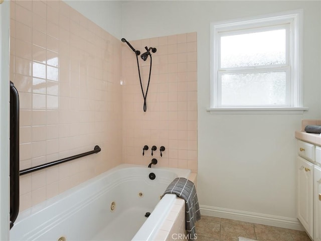 5244 W 137th Pl, Hawthorne, CA 90250 - bathroom featuring tile patterned floors, a combined bath / shower with jetted tub, and baseboards
