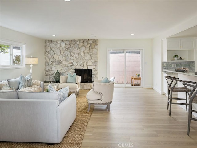 5244 W 137th Pl, Hawthorne, CA 90250 - living room featuring a fireplace, light wood-type flooring, and recessed lighting