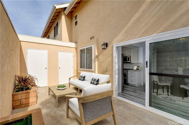 3500 W Manchester Blvd Unit 15, Inglewood, CA 90305 - view of patio with an outdoor hangout area and visible vents