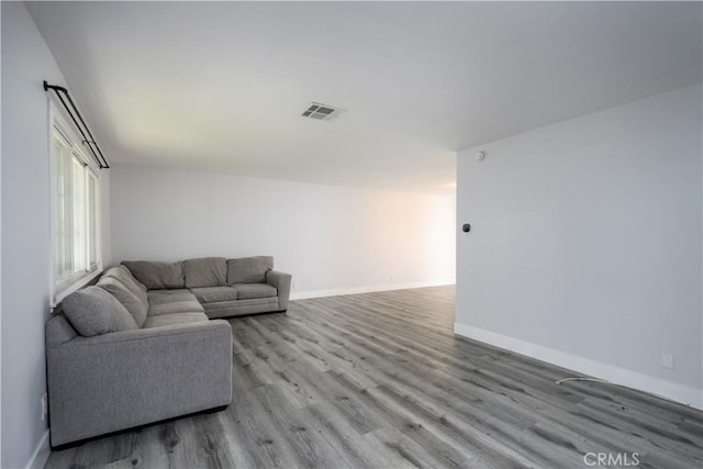 3500 W Manchester Blvd Unit 15, Inglewood, CA 90305 - living room with baseboards, visible vents, and wood finished floors