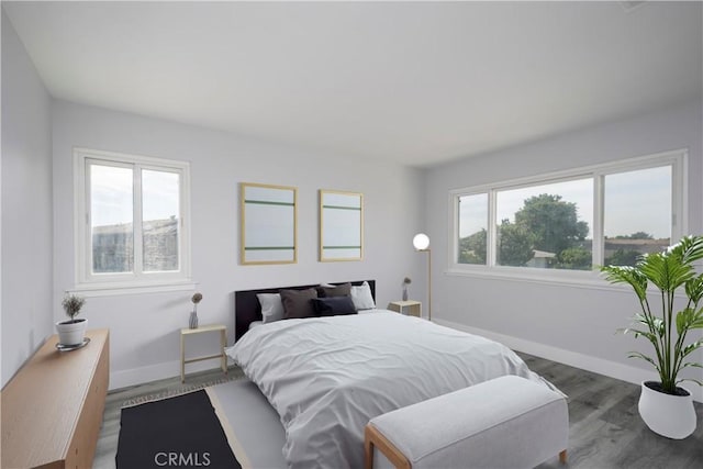 3500 W Manchester Blvd Unit 15, Inglewood, CA 90305 - bedroom featuring wood finished floors and baseboards