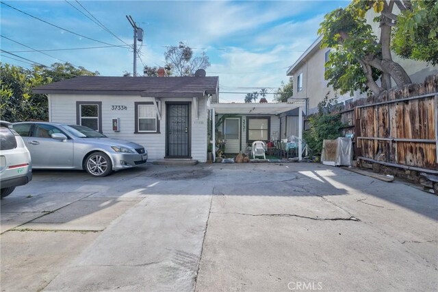 3731 Glendon Ave, Los Angeles, CA 90034 - exterior space featuring fence and concrete driveway