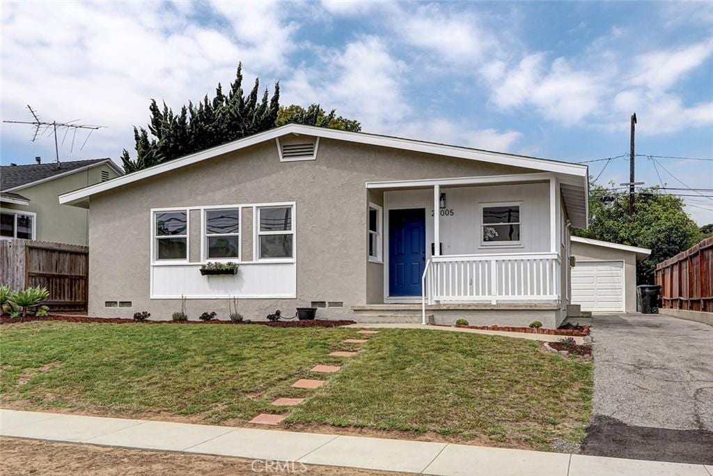 22005 Palos Verdes Blvd, Torrance, CA 90503 - view of front of house featuring driveway, an outdoor structure, a porch, a garage, and stucco siding