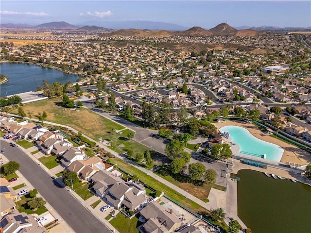 30151 Via Amante, Menifee, CA 92584 - aerial overview of property's location with nearby suburban area, a water and mountain view, and a pool