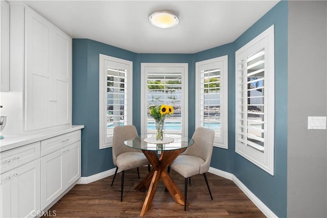 30151 Via Amante, Menifee, CA 92584 - dining area with dark wood finished floors and baseboards