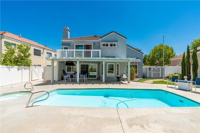 30151 Via Amante, Menifee, CA 92584 - rear view of property featuring a patio, a fenced backyard, and a chimney