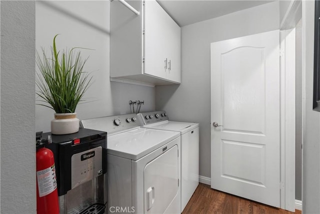 30151 Via Amante, Menifee, CA 92584 - washroom featuring cabinet space, separate washer and dryer, and dark wood finished floors
