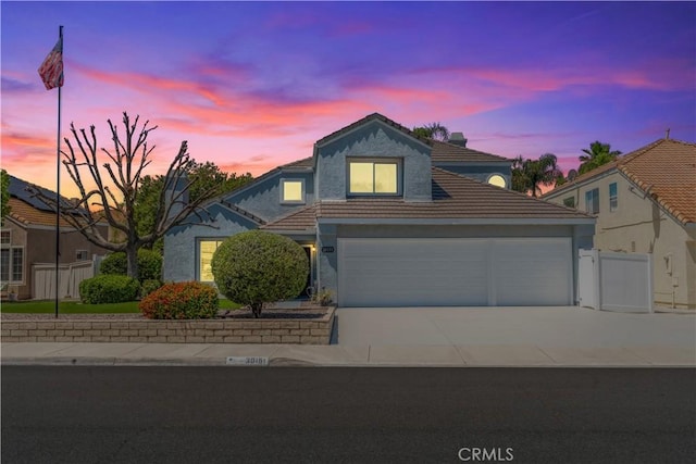 30151 Via Amante, Menifee, CA 92584 - traditional home with a tiled roof, driveway, and stucco siding