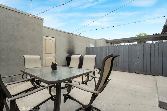 17730 Regency Cir, Bellflower, CA 90706 - view of patio featuring fence and outdoor dining space
