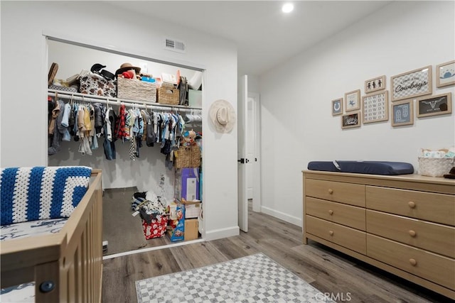 17730 Regency Cir, Bellflower, CA 90706 - bedroom featuring a closet, wood finished floors, visible vents, recessed lighting, and baseboards