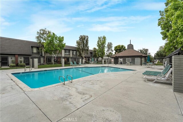 17730 Regency Cir, Bellflower, CA 90706 - pool featuring a patio and fence