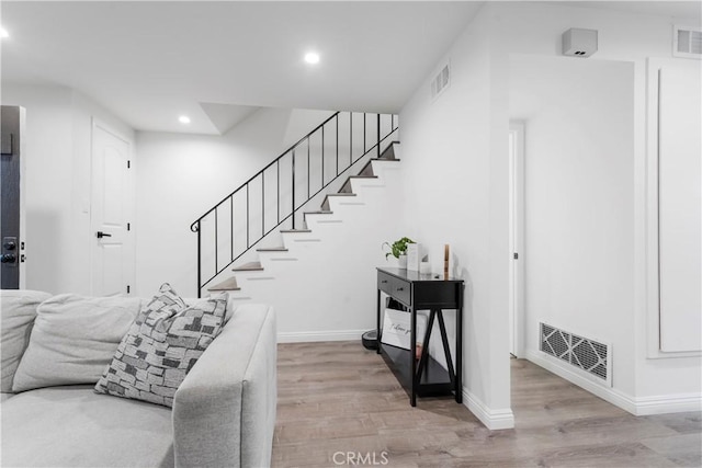 17730 Regency Cir, Bellflower, CA 90706 - stairway featuring baseboards, recessed lighting, visible vents, and wood finished floors
